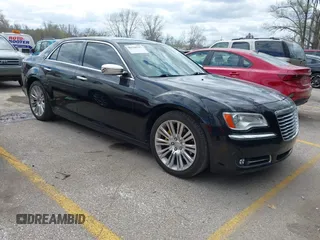 2012 Chrysler 300 with VIN 2C3CCAET1CH284661, listed as a IAAI auction lot 41920717 with 123,505 mi miles. Bid and sale history available at carsss.com. Image 1.