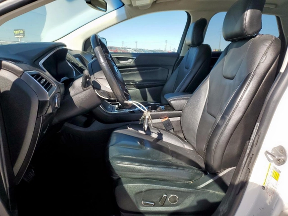2015 Ford Edge Titanium z VIN 2FMTK3K93FBC38982, wystawiony jako Copart lot #50225465 z przebiegiem 126 110 mil mil oraz Czysty tytuł • Clean title. Historia ofert i sprzedaży dostępna na DreamBid. Obrazek 7.