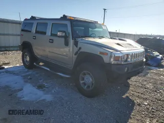2005 Hummer H2 SUV with VIN 5GRGN23U55H128736, listed as a Copart auction lot 41780105 with 185,193 mi miles and Salvage Title. Bid and sale history available at carsss.com. Image 4.