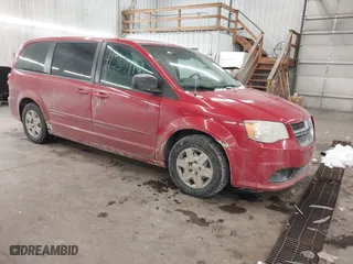 2012 Dodge Grand Caravan SE with VIN 2C4RDGBG7CR288009, listed as a IAAI auction lot 41557118 with 223,287 mi miles. Bid and sale history available at carsss.com. Image 1.