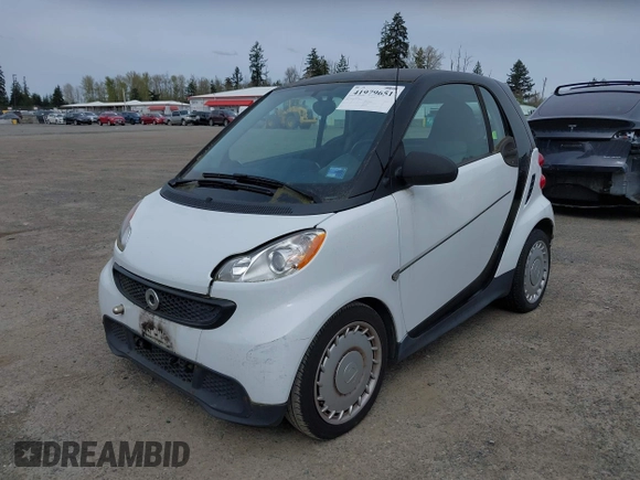 2014 Smart fortwo Pure with VIN WMEEJ3BA8EK747384, listed as a IAAI auction lot 41979651 with 29,586 mi miles and . Bid and sale history available at DreamBid. Image 2.