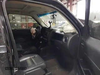 2014 Jeep Patriot Latitude with VIN 1C4NJPFA9ED887903, listed as a IAAI auction lot 41228274 with 82,225 mi miles and . Bid and sale history available at carsss.com. Image 5.
