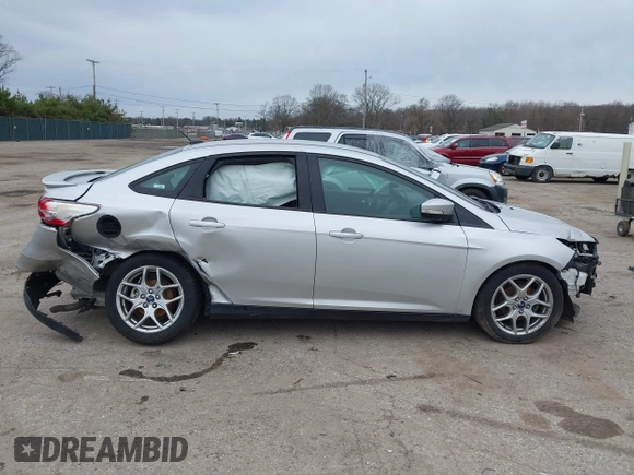 2015 Ford Focus SE with VIN 1FADP3F24FL347206, listed as a IAAI auction lot 41941987 with 96,473 mi miles and . Bid and sale history available at DreamBid. Image 14.