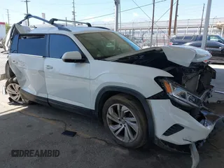 2021 Volkswagen Atlas SE z VIN 1V2HR2CA8MC514027, wystawiony jako IAAI lot #42260413 z przebiegiem 37 687 mil mil oraz . Historia ofert i sprzedaży dostępna na DreamBid. Obrazek 1.