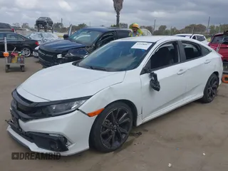 2019 Honda Civic Sport with VIN 19XFC2F82KE013269, listed as a IAAI auction lot 42118857 with 80,212 mi miles and . Bid and sale history available at DreamBid. Image 17.