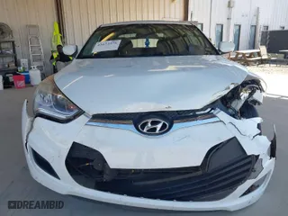2016 Hyundai Veloster with VIN KMHTC6AD5GU268842, listed as a IAAI auction lot 41672376 with 156,703 mi miles. Bid and sale history available at carsss.com. Image 6.