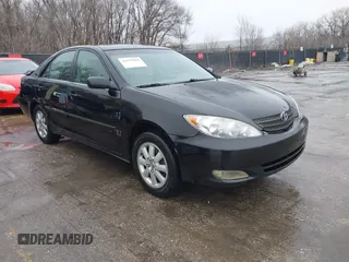 2004 Toyota Camry LE with VIN 4T1BF32K84U074364, listed as a IAAI auction lot 41479264 with 265,865 mi miles. Bid and sale history available at carsss.com. Image 1.