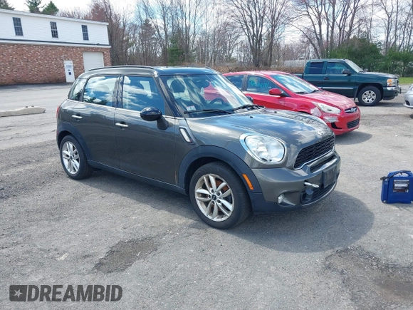 2014 MINI Countryman S with VIN WMWZC3C58EWP27041, listed as a IAAI auction lot 42082489 with 77,749 mi miles and . Bid and sale history available at DreamBid. Image 1.