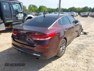 2020 Kia Optima LX with VIN 5XXGT4L3XLG451698, listed as a IAAI auction lot 42031333 with 68,714 mi miles and . Bid and sale history available at DreamBid. Image 4.