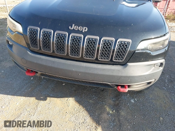2019 Jeep Cherokee Trailhawk with VIN 1C4PJMBX3KD483895, listed as a IAAI auction lot 42696774 with 122,932 mi miles and . Bid and sale history available at DreamBid. Image 6.