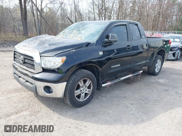 2007 Toyota Tundra SR5 z VIN 5TFBT54117X005726, wystawiony jako IAAI lot #42105716 z przebiegiem 84 828 mil mil oraz . Historia ofert i sprzedaży dostępna na DreamBid. Obrazek 17.