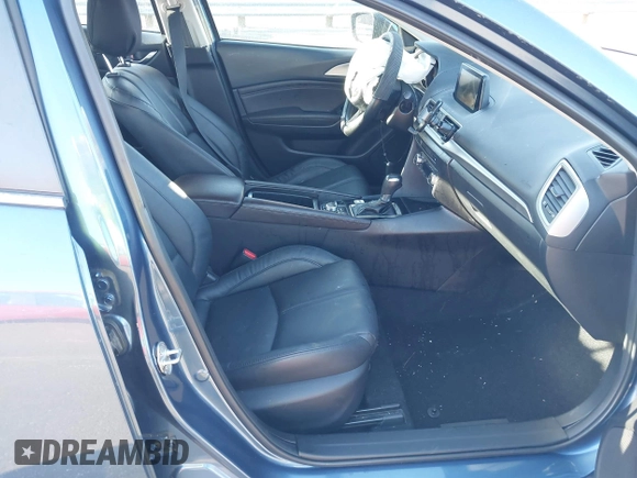 2017 Mazda 3 Touring with VIN 3MZBN1V74HM104034, listed as a IAAI auction lot 41823286 with 53,282 mi miles and . Bid and sale history available at DreamBid. Image 5.