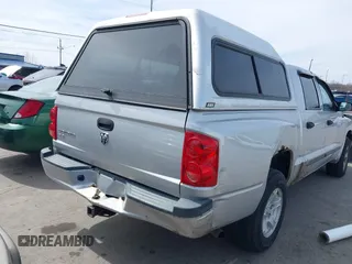 2007 Dodge Dakota SLT with VIN 1D7HE48K57S147503, listed as a IAAI auction lot 41858271 with 242,534 mi miles and . Bid and sale history available at DreamBid. Image 4.