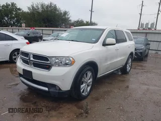 2012 Dodge Durango SXT with VIN 1C4RDHAG5CC308449, listed as a IAAI auction lot 41522856 with 111,284 mi miles and . Bid and sale history available at DreamBid. Image 2.