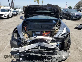 2024 Tesla Model Y с VIN 7SAYGDED5RF177307, выставлен на аукционе Copart как лот 57170315 с пробегом 14 726 миль миль и Списание • Salvage title. История ставок и продаж доступна на DreamBid. Изображение 5.