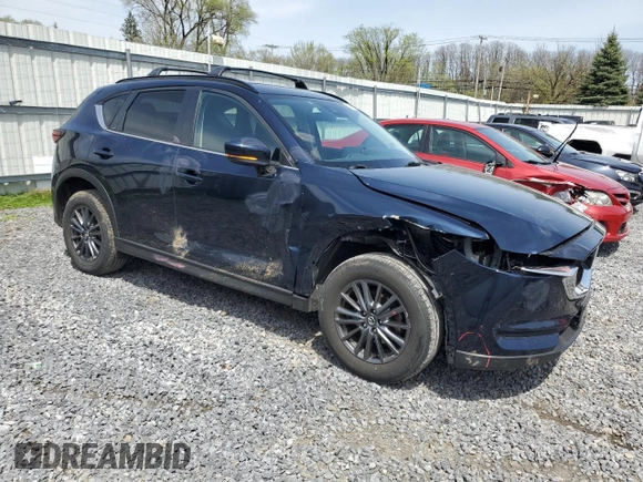 2021 Mazda CX-5 Touring with VIN JM3KFBCM0M0302015, listed as a Copart auction lot 55077305 with 40,558 mi miles and Salvage Title. Bid and sale history available at carsss.com. Image 4.