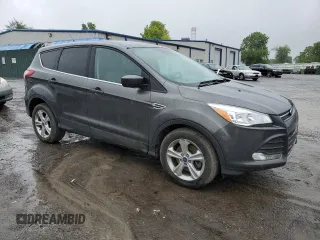 2016 Ford Escape SE z VIN 1FMCU9GX6GUA02410, wystawiony jako Copart lot #58623545 z przebiegiem 106 992 mil mil oraz Tytuł czysty. Historia ofert i sprzedaży dostępna na DreamBid. Obrazek 4.