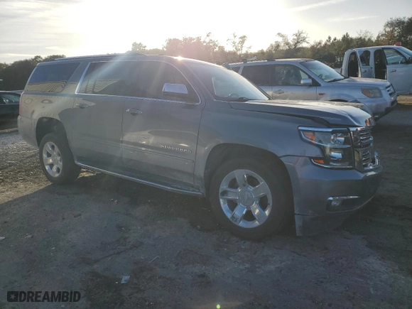 2020 Chevrolet Suburban Premier with VIN 1GNSCJKC5LR163330, listed as a Copart auction lot 85289904 with 83,448 mi miles and Salvage Title. Bid and sale history available at carsss.com. Image 4.