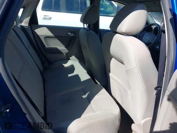 2010 Ford Focus SES with VIN 1FAHP3GN8AW165221, listed as a IAAI auction lot 41864224 with 148,785 mi miles. Bid and sale history available at carsss.com. Image 8.