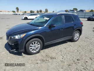 2016 Mazda CX-5 Sport with VIN JM3KE2BY6G0727332, listed as a Copart auction lot 62221175 with 92,026 mi miles and Salvage title. Bid and sale history available at DreamBid. Image 1.