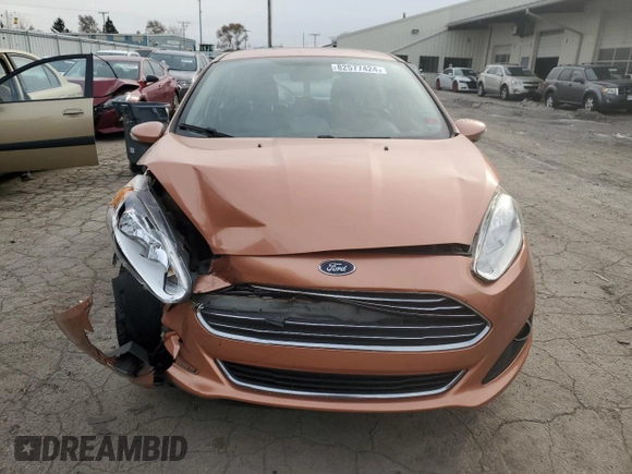 2017 Ford Fiesta Titanium with VIN 3FADP4FJ8HM164132, listed as a Copart auction lot 82577424 with 63,686 mi miles and Salvage Title. Bid and sale history available at DreamBid. Image 5.