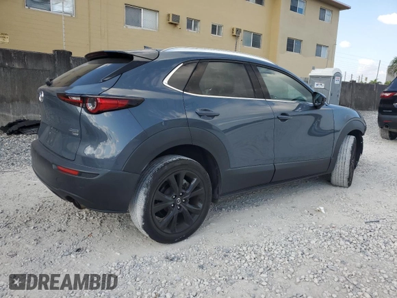 2021 Mazda CX-30 Premium with VIN 3MVDMBDY2MM306250, listed as a Copart auction lot 53430615 with 59,112 mi miles and Salvage title. Bid and sale history available at DreamBid. Image 3.