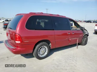 1999 Chrysler Town & Country LXi with VIN 1C4GP64L0XB536320, listed as a Copart auction lot 74194134 with Not Provided miles and Salvage Title. Bid and sale history available at carsss.com. Image 3.