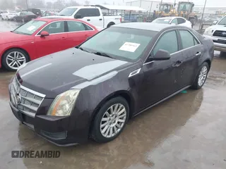 2010 Cadillac CTS Luxury with VIN 1G6DE5EG7A0123935, listed as a IAAI auction lot 41380563 with 182,671 mi miles. Bid and sale history available at carsss.com. Image 2.