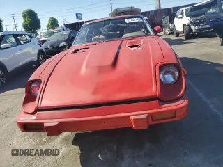 1983 Datsun 280ZX z VIN JN1HZ04S4DX568496, wystawiony jako Copart lot #57705145 z przebiegiem 328 479 mil mil oraz Tytuł czysty. Historia ofert i sprzedaży dostępna na DreamBid. Obrazek 5.