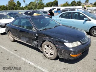1999 Acura CL Premium with VIN 19UYA3151XL000577, listed as a Copart auction lot 57121864 with 212,133 mi miles and Salvage Title. Bid and sale history available at carsss.com. Image 4.
