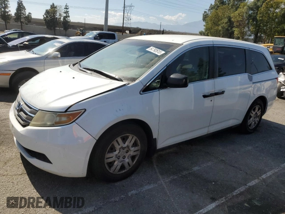 2011 Honda Odyssey LX with VIN 5FNRL5H27BB054711, listed as a Copart auction lot 54792615 with 156,675 mi miles and Clean title. Bid and sale history available at DreamBid. Image 1.