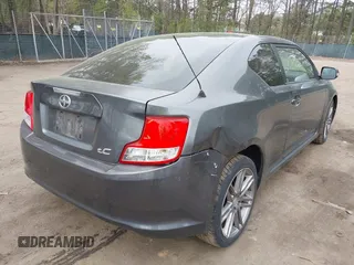 2012 Scion tC with VIN JTKJF5C7XC3031406, listed as a IAAI auction lot 41947478 with 150,762 mi miles. Bid and sale history available at carsss.com. Image 4.