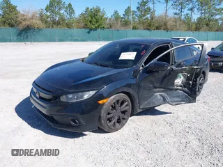 2019 Honda Civic Sedan Sport with VIN 2HGFC2F80KH519978, listed as a IAAI auction lot 41759437 with 118,138 mi miles. Bid and sale history available at carsss.com. Image 2.