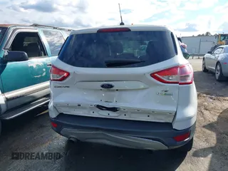 2014 Ford Escape SE with VIN 1FMCU0GX0EUE35004, listed as a IAAI auction lot 40811631 with 126,464 mi miles. Bid and sale history available at carsss.com. Image 17.
