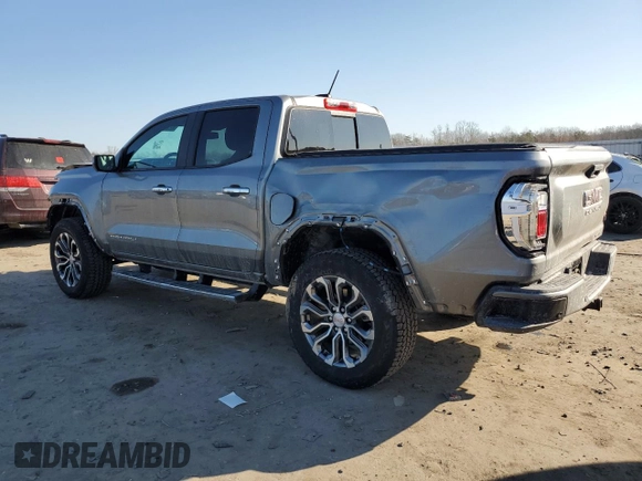 2023 GMC Canyon 4WD Denali with VIN 1GTP6FEK3P1262139, listed as a Copart auction lot 42386625 with 7,442 mi miles and Salvage Title. Bid and sale history available at carsss.com. Image 2.