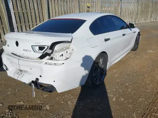 2015 BMW 6 Series 650i with VIN WBA6B2C54FGB99173, listed as a IAAI auction lot 41692594 with 123,664 mi miles and . Bid and sale history available at carsss.com. Image 4.