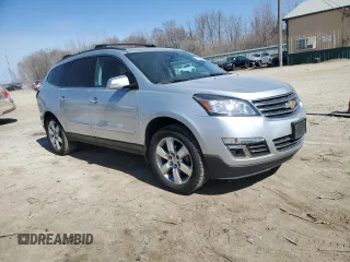 2016 Chevrolet Traverse LTZ with VIN 1GNKVJKD2GJ238668, listed as a Copart auction lot 48658965 with 106,924 mi miles and Salvage Title. Bid and sale history available at DreamBid. Image 4.