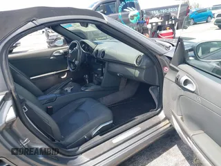 2007 Porsche Boxster z VIN WP0CA29877U710966, wystawiony jako IAAI lot #39794748 z przebiegiem 147 803 mil mil oraz . Historia ofert i sprzedaży dostępna na DreamBid. Obrazek 5.