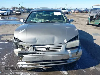 1998 Toyota Camry LE z VIN 4T1BG28KXWU248887, wystawiony jako IAAI lot #41507392 z przebiegiem Nie podano mil oraz . Historia ofert i sprzedaży dostępna na DreamBid. Obrazek 11.