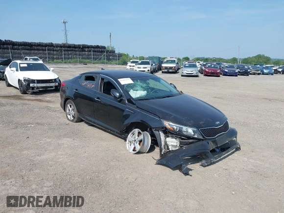 2015 Kia Optima LX with VIN KNAGM4A7XF5653580, listed as a IAAI auction lot 42483072 with 103,589 mi miles and . Bid and sale history available at DreamBid. Image 1.