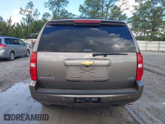2012 Chevrolet Tahoe LT z VIN 1GNSCBE08CR320257, wystawiony jako IAAI lot #42214920 z przebiegiem 189 532 mil mil oraz . Historia ofert i sprzedaży dostępna na DreamBid. Obrazek 6.