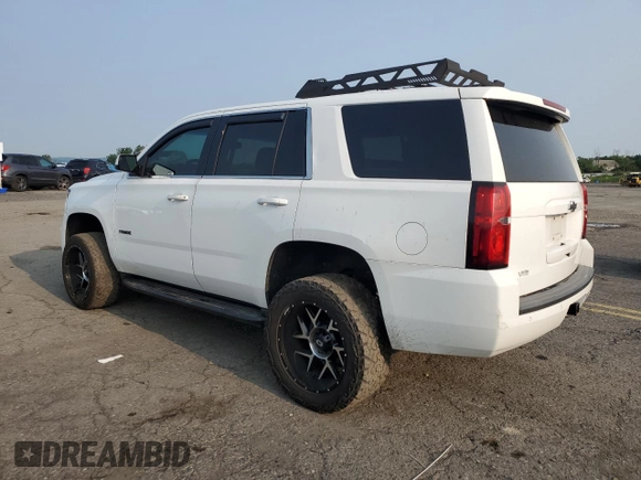 2015 Chevrolet Tahoe Commercial with VIN 1GNLC2EC1FR296841, listed as a Copart auction lot 60160605 with 105,096 mi miles and Salvage title. Bid and sale history available at DreamBid. Image 2.