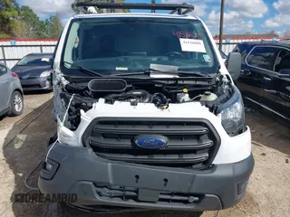 2020 Ford Transit Cargo with VIN 1FTYE1Y89LKA52806, listed as a IAAI auction lot 41528000 with 70,947 mi miles and . Bid and sale history available at DreamBid. Image 13.