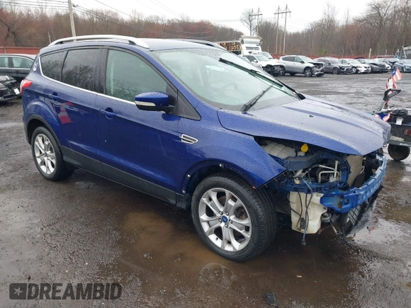 2014 Ford Escape Titanium with VIN 1FMCU9J99EUA46103, listed as a IAAI auction lot 42018097 with 169,878 mi miles and . Bid and sale history available at DreamBid. Image 1.