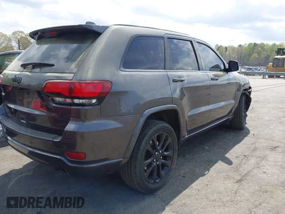 2019 Jeep Grand Cherokee Altitude with VIN 1C4RJFAG5KC854048, listed as a IAAI auction lot 41955935 with 93,972 mi miles and . Bid and sale history available at DreamBid. Image 4.