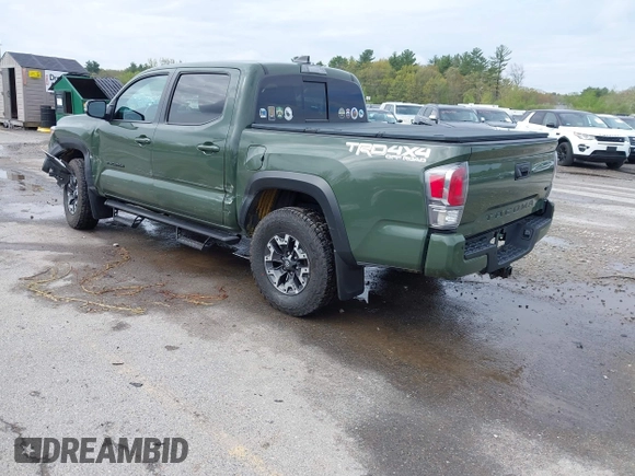 2021 Toyota Tacoma SR with VIN 3TMCZ5AN5MM380286, listed as a IAAI auction lot 42165523 with 58,965 mi miles and . Bid and sale history available at DreamBid. Image 3.