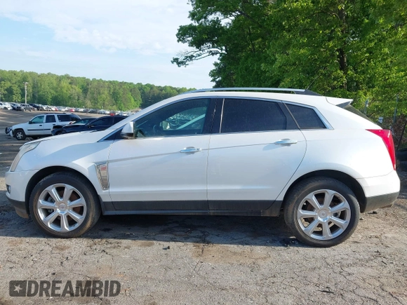 2014 Cadillac SRX Performance Collection with VIN 3GYFNCE36ES662689, listed as a IAAI auction lot 42109417 with 132,957 mi miles. Bid and sale history available at carsss.com. Image 14.