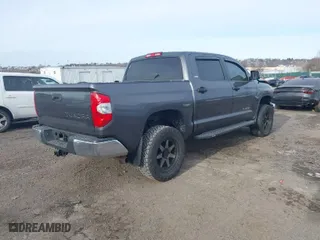 2018 Toyota Tundra 4WD SR5 with VIN 5TFDY5F14JX770184, listed as a IAAI auction lot 41303833 with 93,878 mi miles. Bid and sale history available at carsss.com. Image 4.