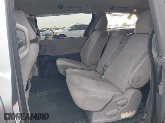 2015 Toyota Sienna LE AAS with VIN 5TDKK3DC6FS627672, listed as a IAAI auction lot 41900555 with 205,111 mi miles. Bid and sale history available at carsss.com. Image 8.
