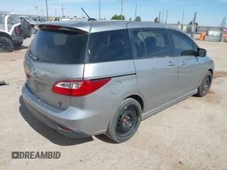 2012 Mazda 5 Grand Touring with VIN JM1CW2DL4C0109772, listed as a IAAI auction lot 42257667 with 161,207 mi miles and . Bid and sale history available at DreamBid. Image 4.